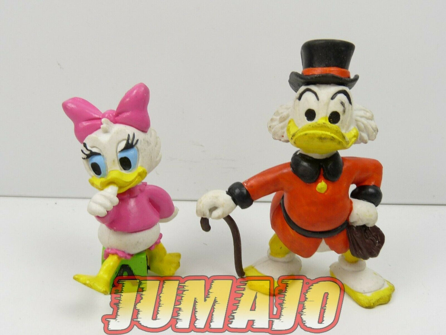 FIG28c lot 2 figurines PVC DISNEY comics spain 7cm PICSOU Dagobert BB Daisy