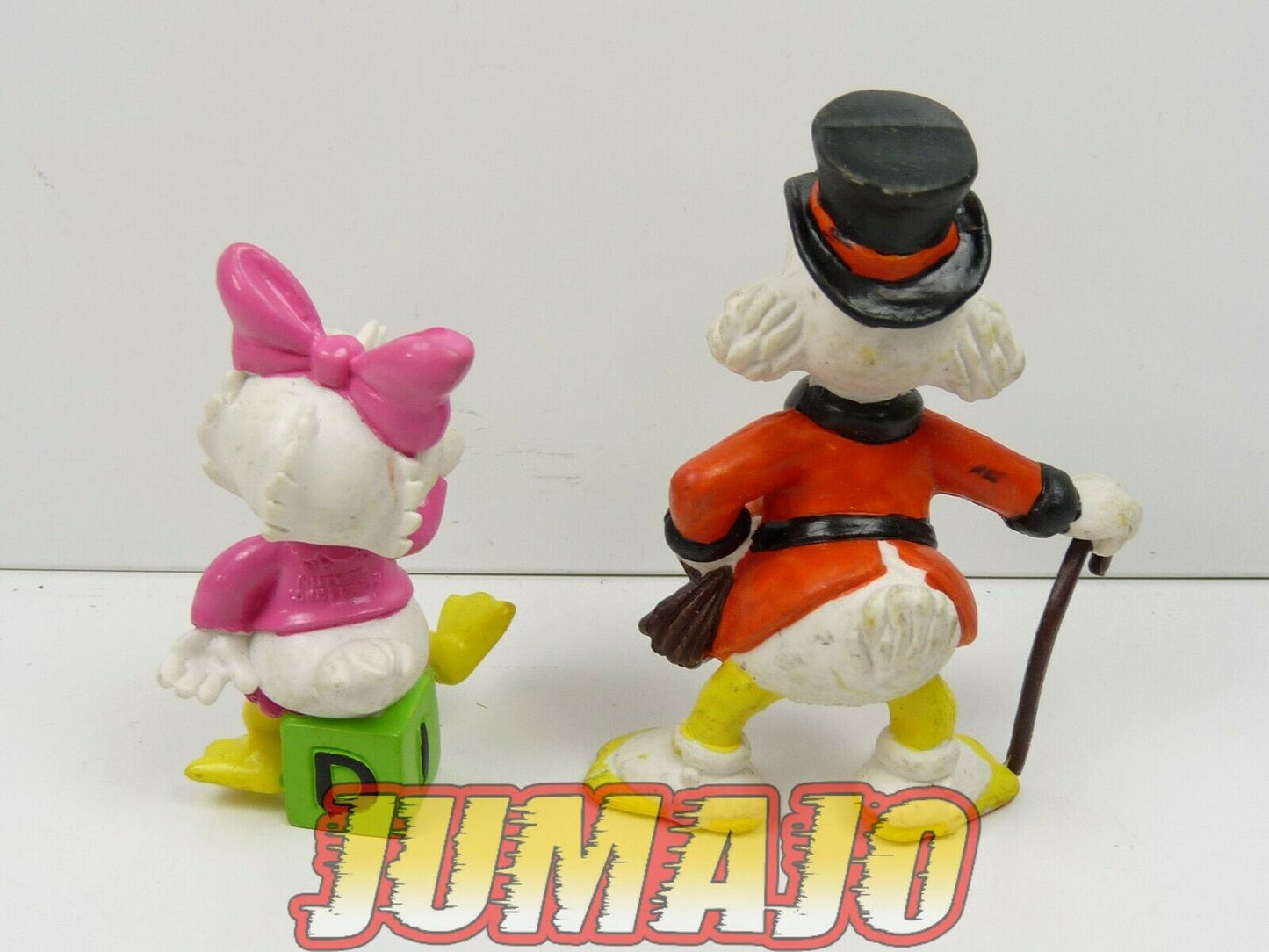 FIG28c lot 2 figurines PVC DISNEY comics spain 7cm PICSOU Dagobert BB Daisy