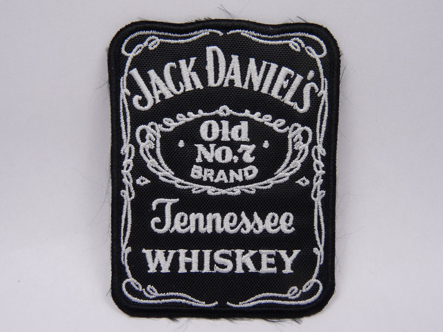 PTC140 Patch brodé thermocollé : logo Jack Daniel's largeur environ 6.5 cm hauteur environ 8.3 cm