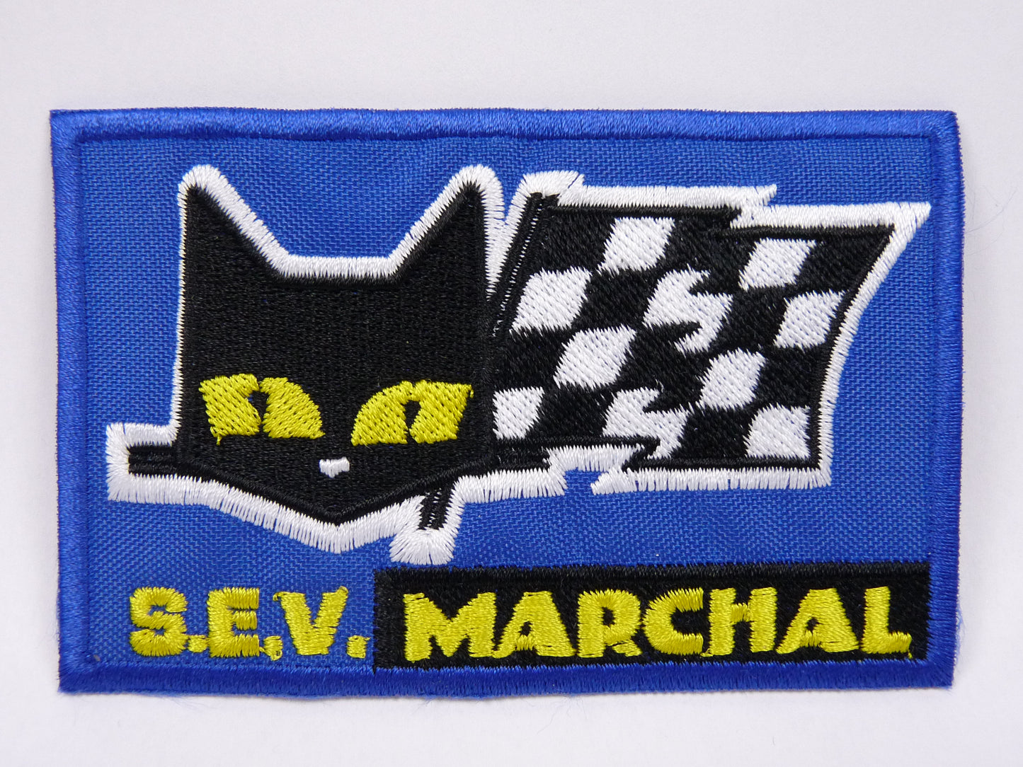 PTC15 Patch brodé thermocollé : logo Marchal largeur environ 10 cm hauteur environ 6.5 cm