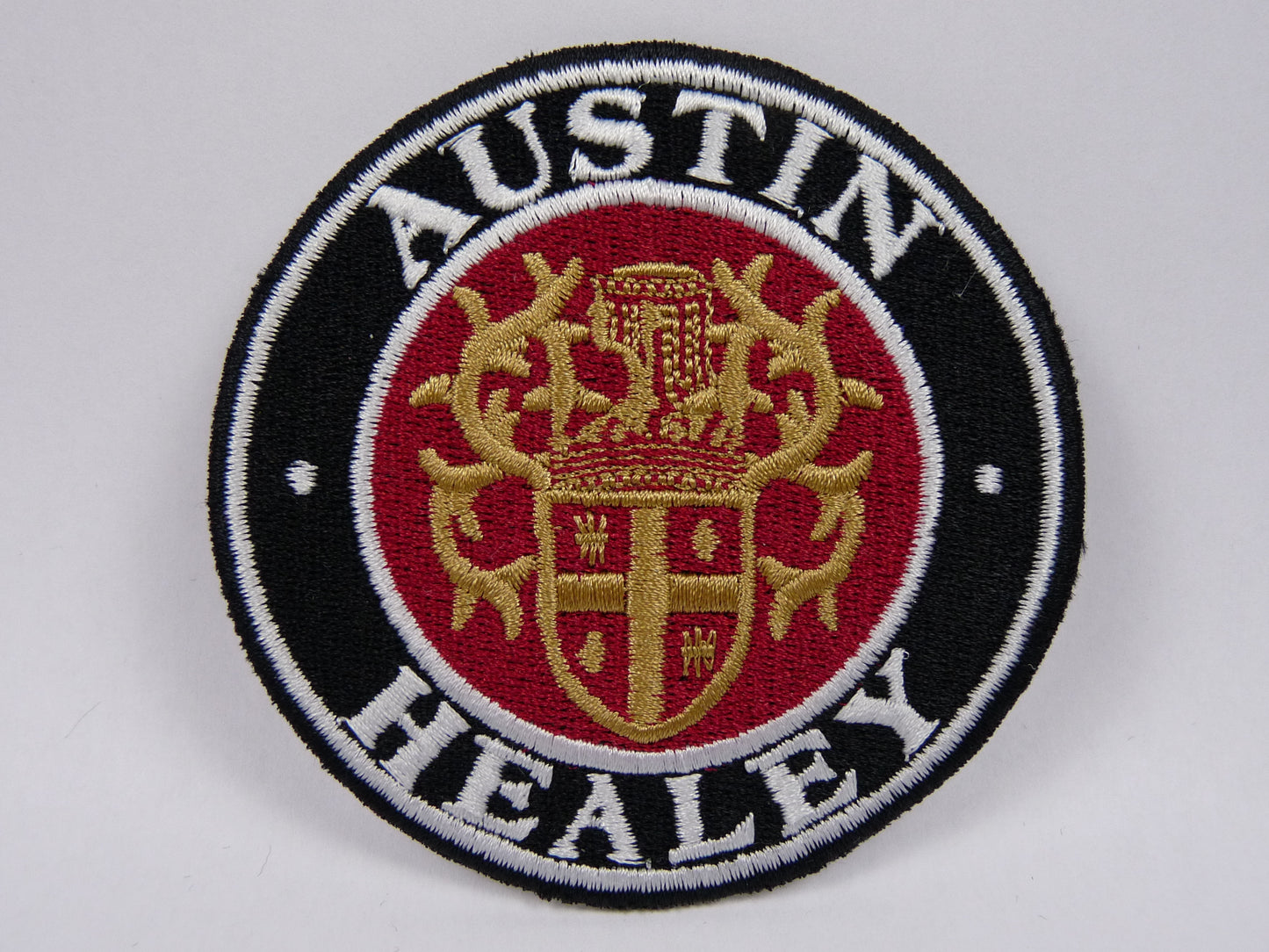 PTC27 Patch brodé thermocollé : logo Austin Healey Diamètre environ 8.3 cm