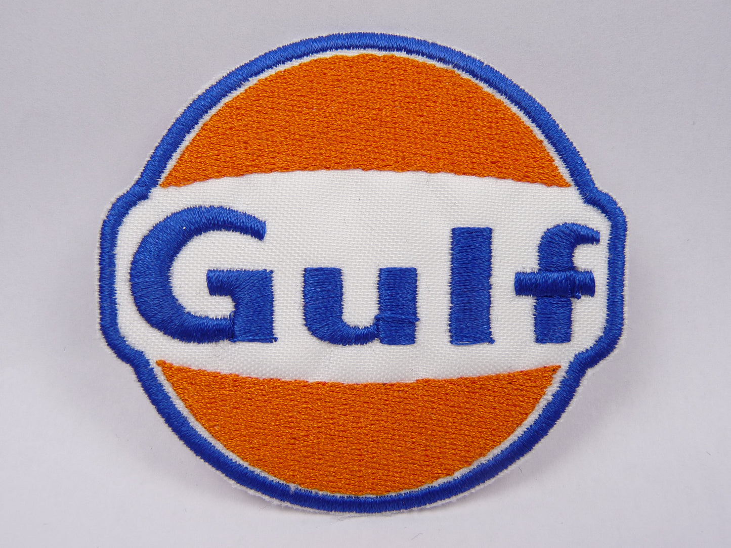 PTC64 Patch brodé thermocollé : logo Gulf écriture largeur environ 7.1 cm hauteur environ 7.1 cm