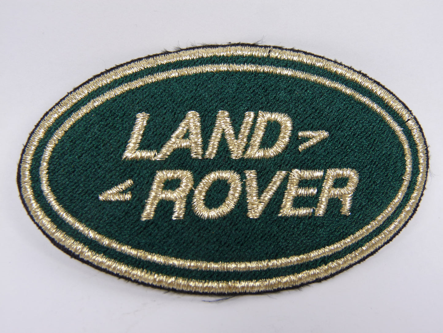 PTC91 Patch brodé thermocollé : logo Land Rover or largeur environ 9.2 cm hauteur environ 5.2 cm