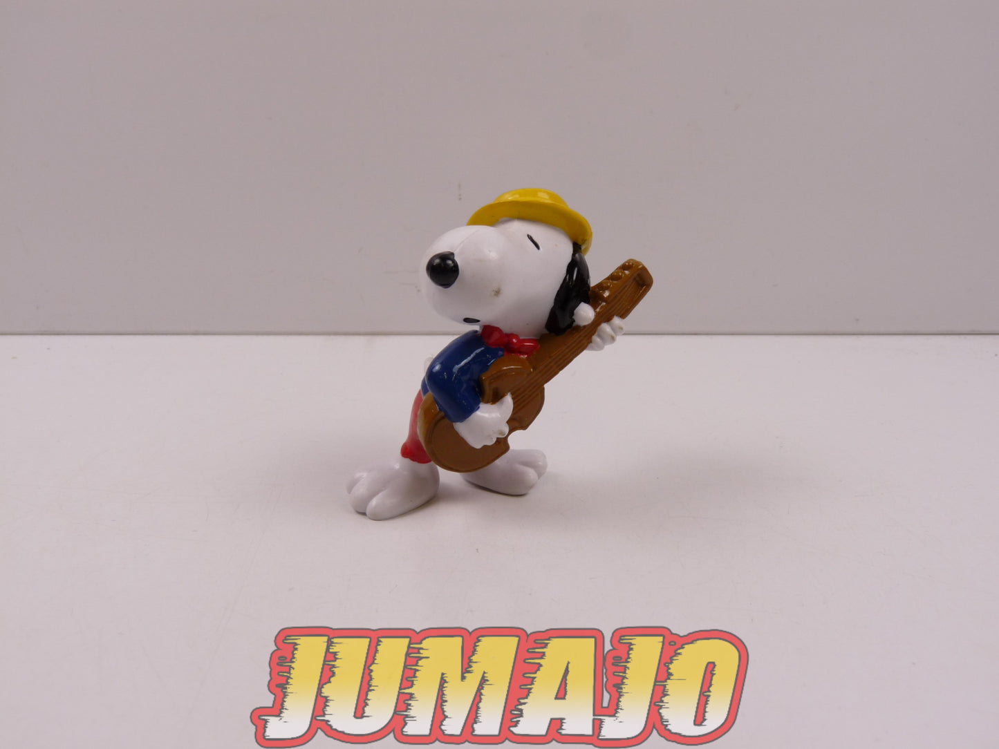 FIG102 : Lot de 4 figurines "Snoopy" SCHLEICH 6cm : Snoopy Aviateur + Hockey + Course + Guitare