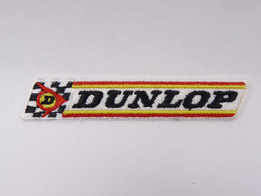 PTC52 Patch brodé thermocollé : logo Dunlop largeur environ 10 cm hauteur environ 1.9 cm